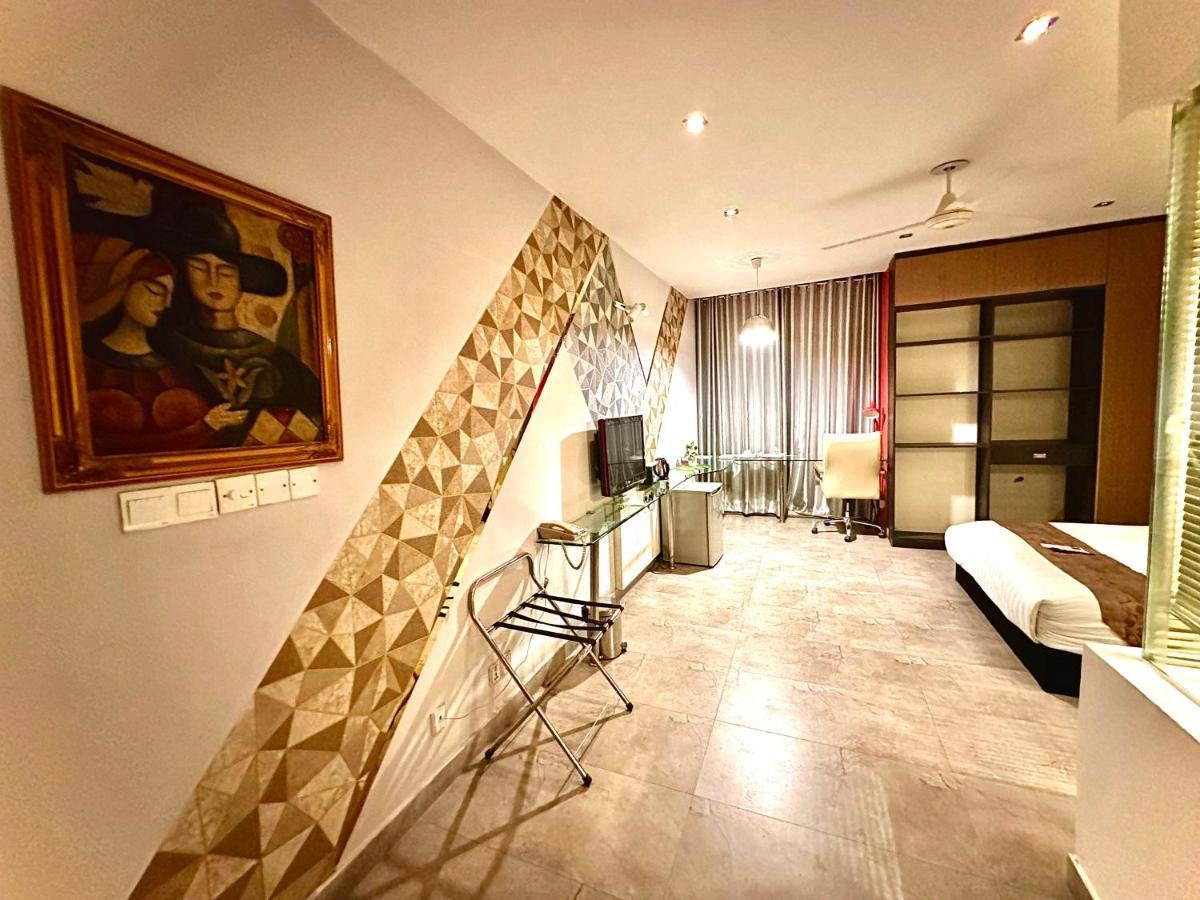 דאהקה Contemporary Heights Hotel And Apartments מראה חיצוני תמונה