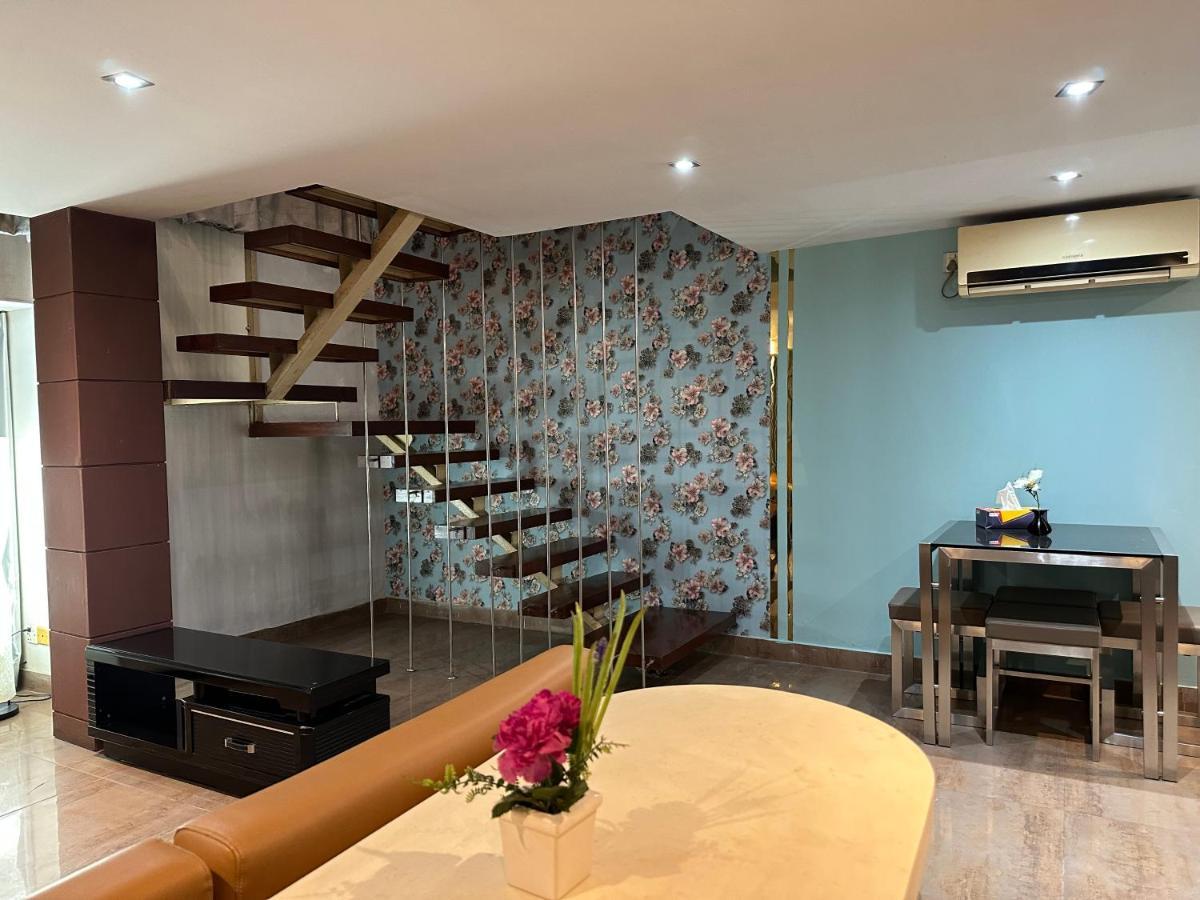 דאהקה Contemporary Heights Hotel And Apartments מראה חיצוני תמונה