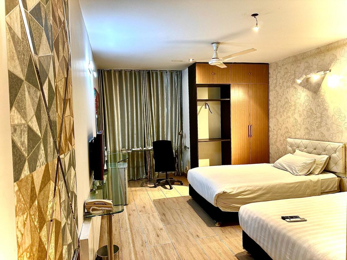 דאהקה Contemporary Heights Hotel And Apartments מראה חיצוני תמונה