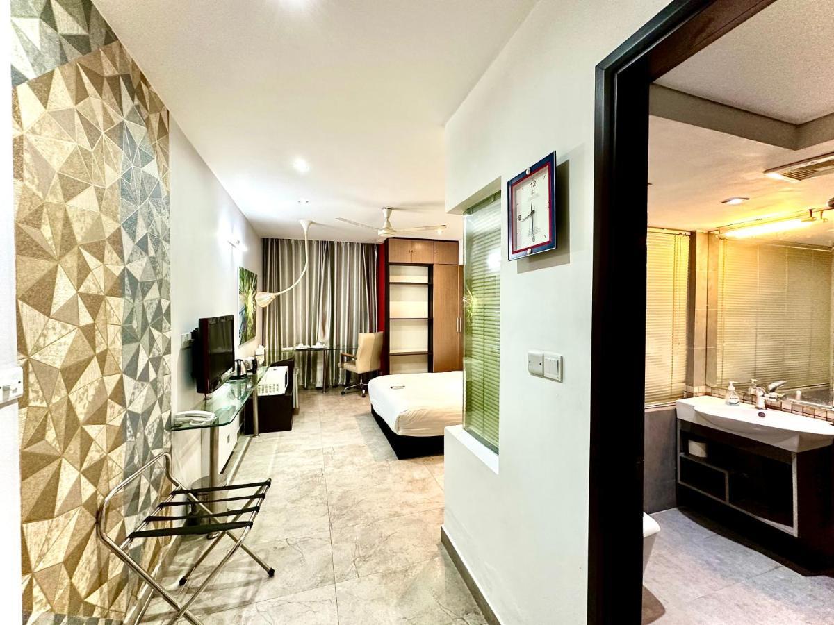 דאהקה Contemporary Heights Hotel And Apartments מראה חיצוני תמונה
